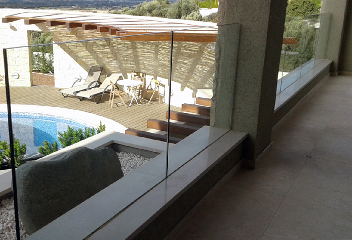 Rail with glass and aluminum base in a villa in Paphos